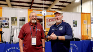 Terry N9AOT and Jim N4BFR at the Wolf River Coils booth during Orlando HamCation 2026