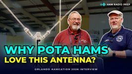Terry N9AOT and Jim N4BFR discussing a Wolf River Coils portable antenna at Orlando HamCation 2026